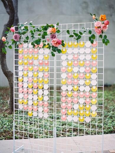 Escort Card Display with Brightly Colored Hexagon Escort Cards with White Wax