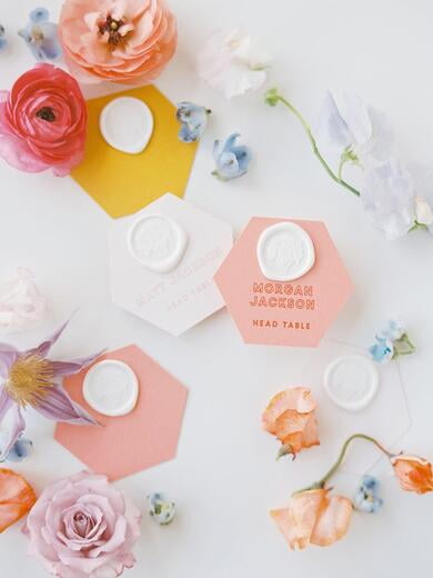 Brightly Colored Hexagon Escort Cards with White Wax Seal