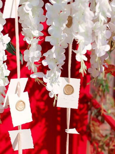 Deckled Edge Escort Cards with Wax Seal in Blush and Gold Inside Telephone Booth