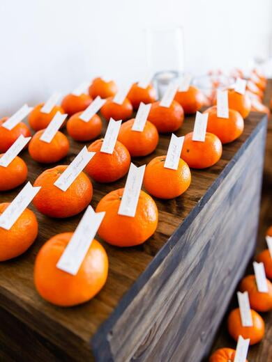 Pennant Tag Escort Cards on Oranges