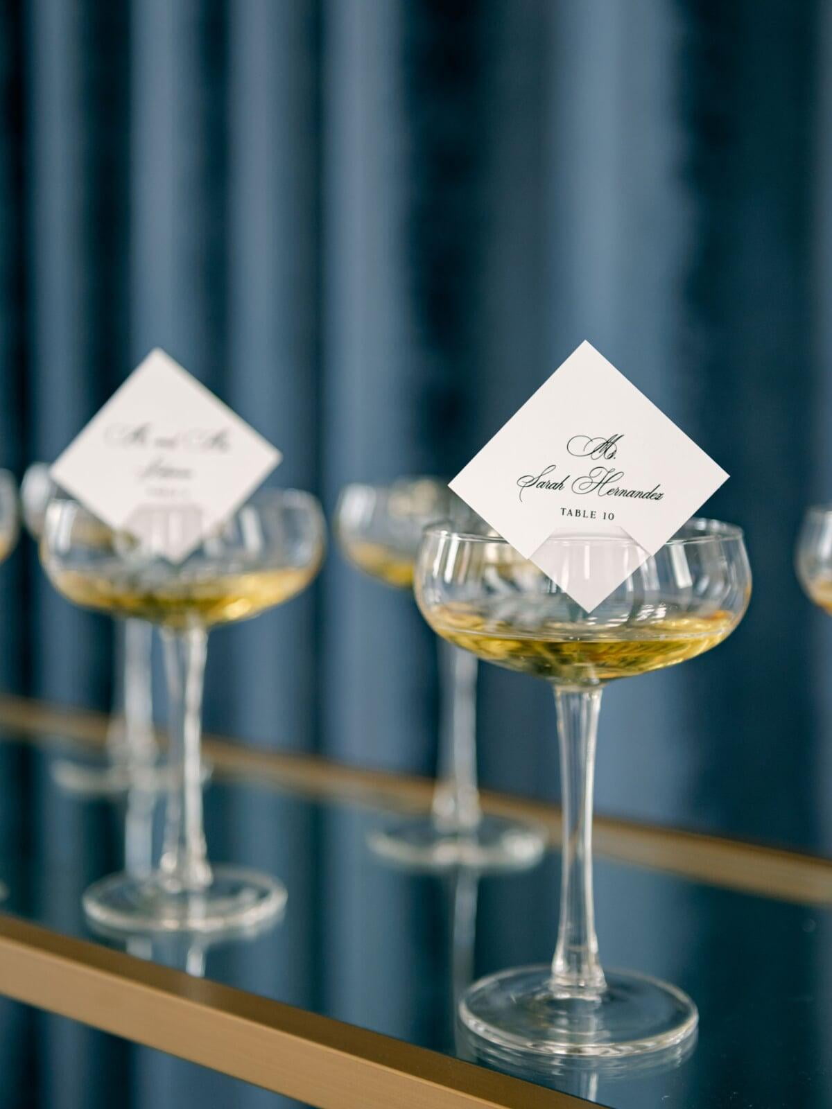 Modern Wedding Champagne Escort Cards in Black and White