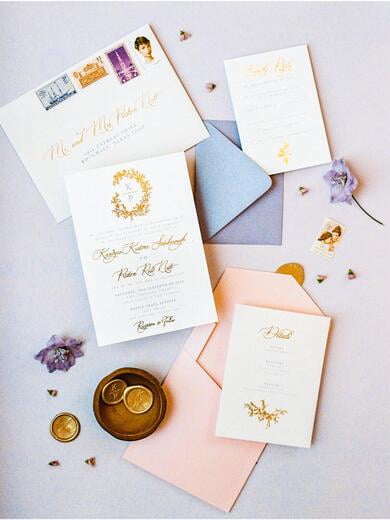 Gold Foil Monogram Wedding Invitation in Blush Pink and Lavender with Vintage Postage Stamps