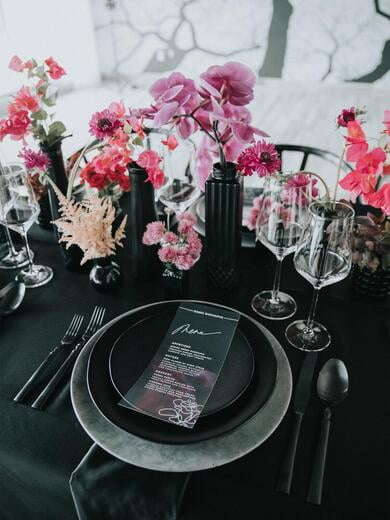 Clear Wedding Menu with White Ink on Black Table