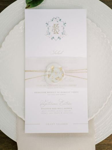 Menu with Water Color Monogram Crest with Vellum Band Wax Seal with Foil Flakes and Gold Cord