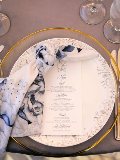 Monogram Crest Atop Wedding Menu in Navy