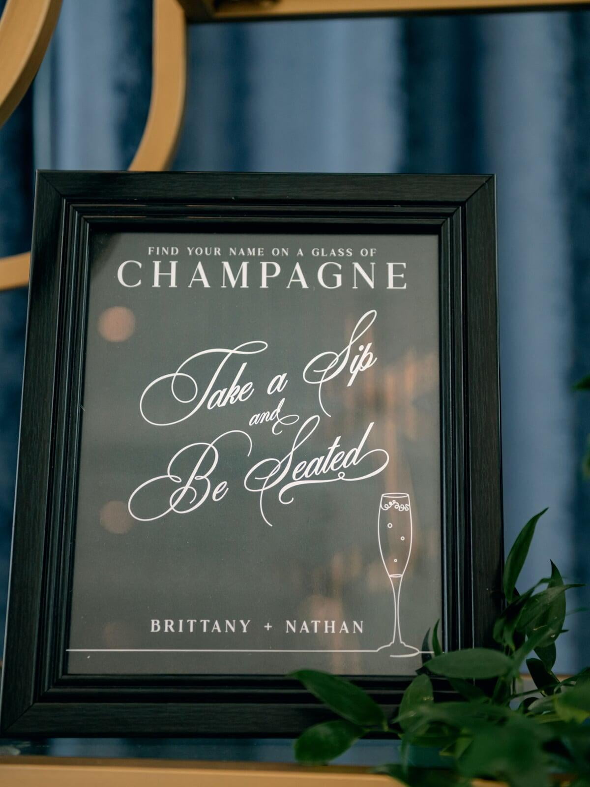 Modern Wedding Sip and Be Seated Escort Sign in Black